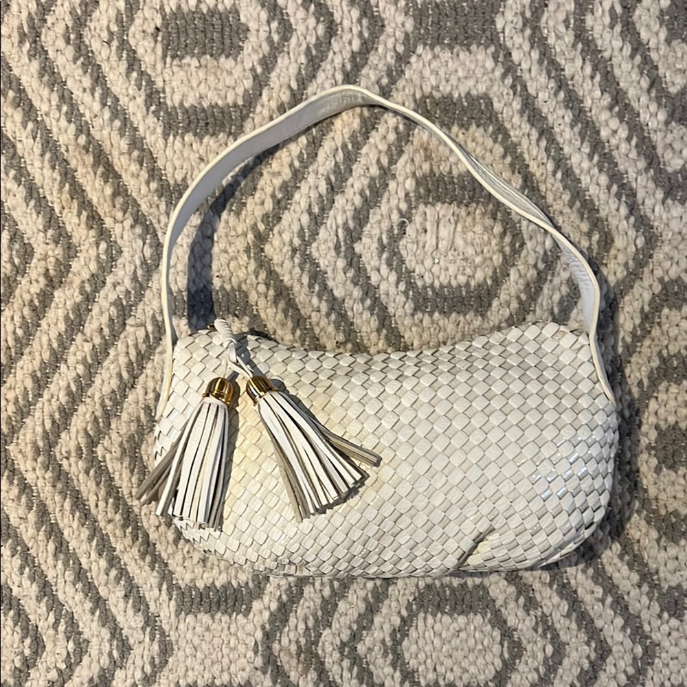 Elliott Lucca White Shoulder Bag with Woven Texture and Tassels